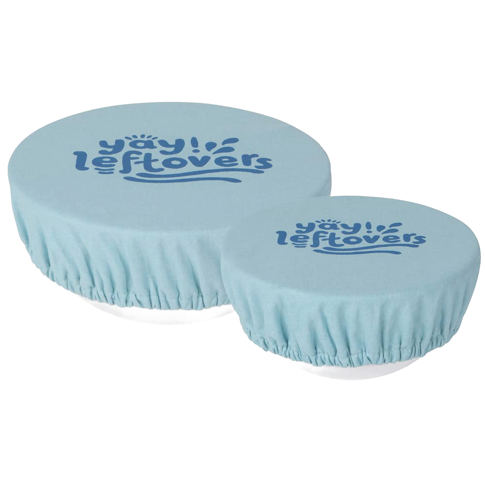 Two reusable light blue fabric bowl covers with elastic edges and "yay leftovers" printed on top, designed to keep food fresh in Kitchen & Food, Storage and Serving collections.