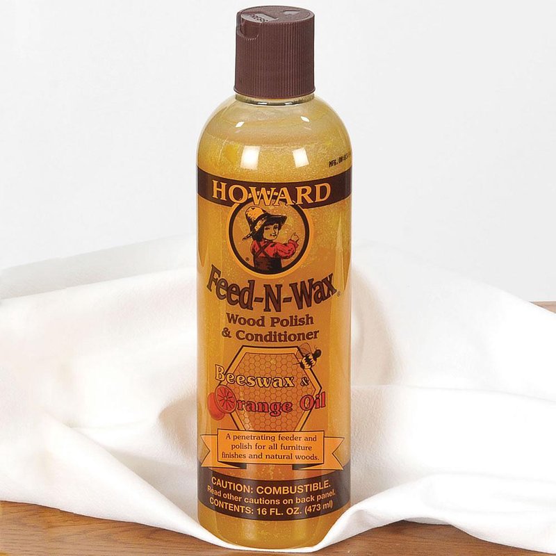 Bottle of Feed-N-Wax wood polish and conditioner featuring beeswax and orange oil, designed to nourish and protect wood finishes, perfect for Home & Decor and Household Cleaning collections.
