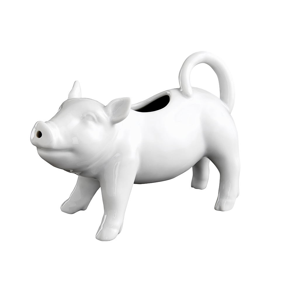 Glossy white porcelain creamer shaped like a playful pig with a drip-free spout, handcrafted for Kitchen & Food, Dinnerware, Storage and Serving, and Best Sellers collections.