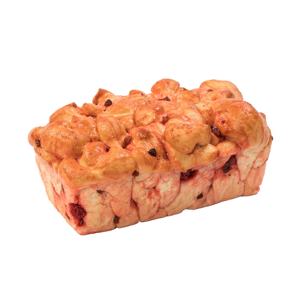 Loaf of handcrafted cherry nut bread with a soft, golden crust and visible cherries and nuts, made in the USA, featured in Kitchen & Food and Snacks and Sweets collections.
