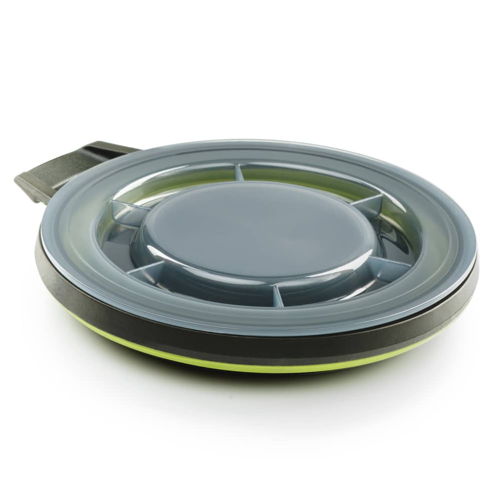 Collapsible bowl with a secure screw-on lid in muted colors, designed for easy transport and use in camping, farm, garden, and tool collections.