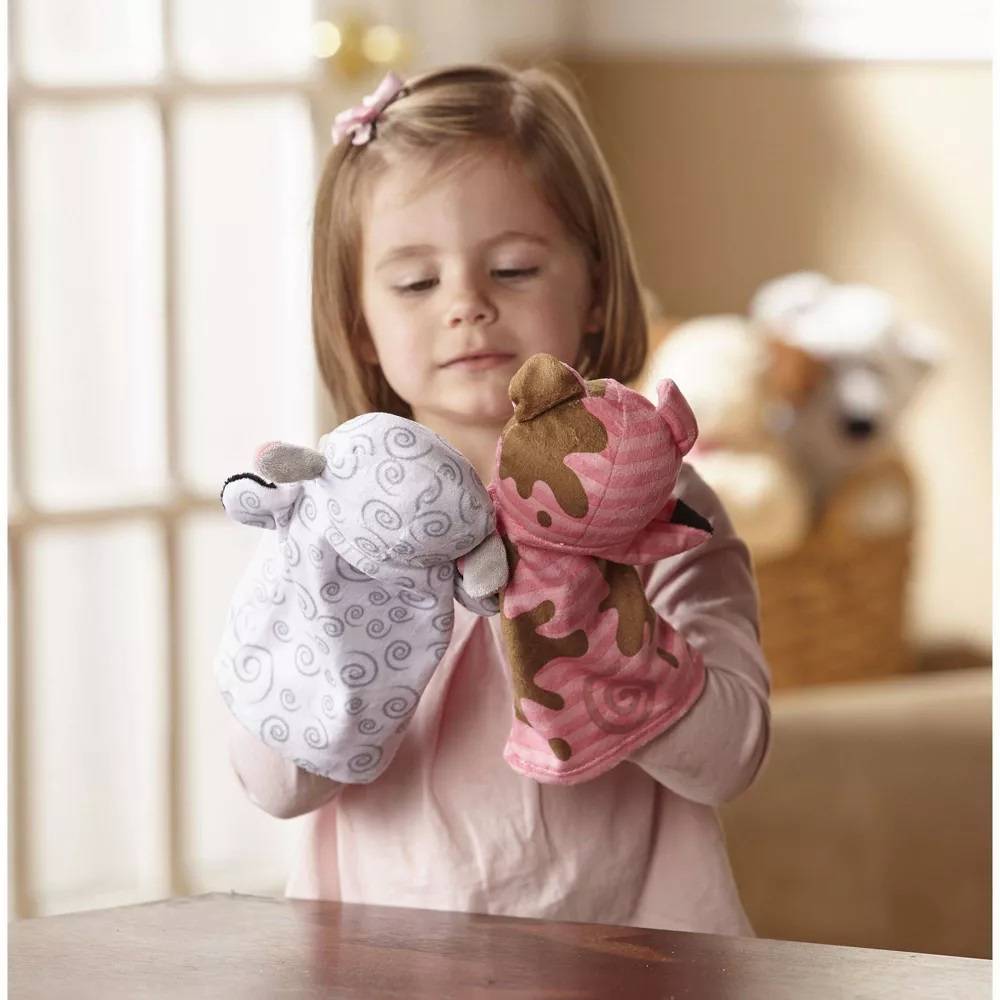 Young child playing with two brightly patterned farm animal hand puppets made with washable fabrics, ideal for imaginative play in Toys, Books & Games, Children's Toys, Dolls and Doll Accessories, Indoor Play, Best Sellers, Promo Eligible collections.