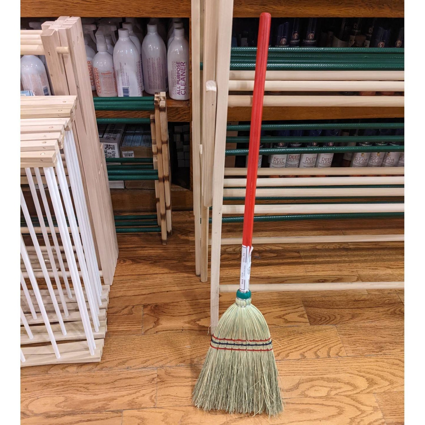 Handcrafted authentic child’s broom with natural corn straw bristles and a red wooden handle, made in the USA, perfect for children's toys, home decor, and light cleaning tasks.