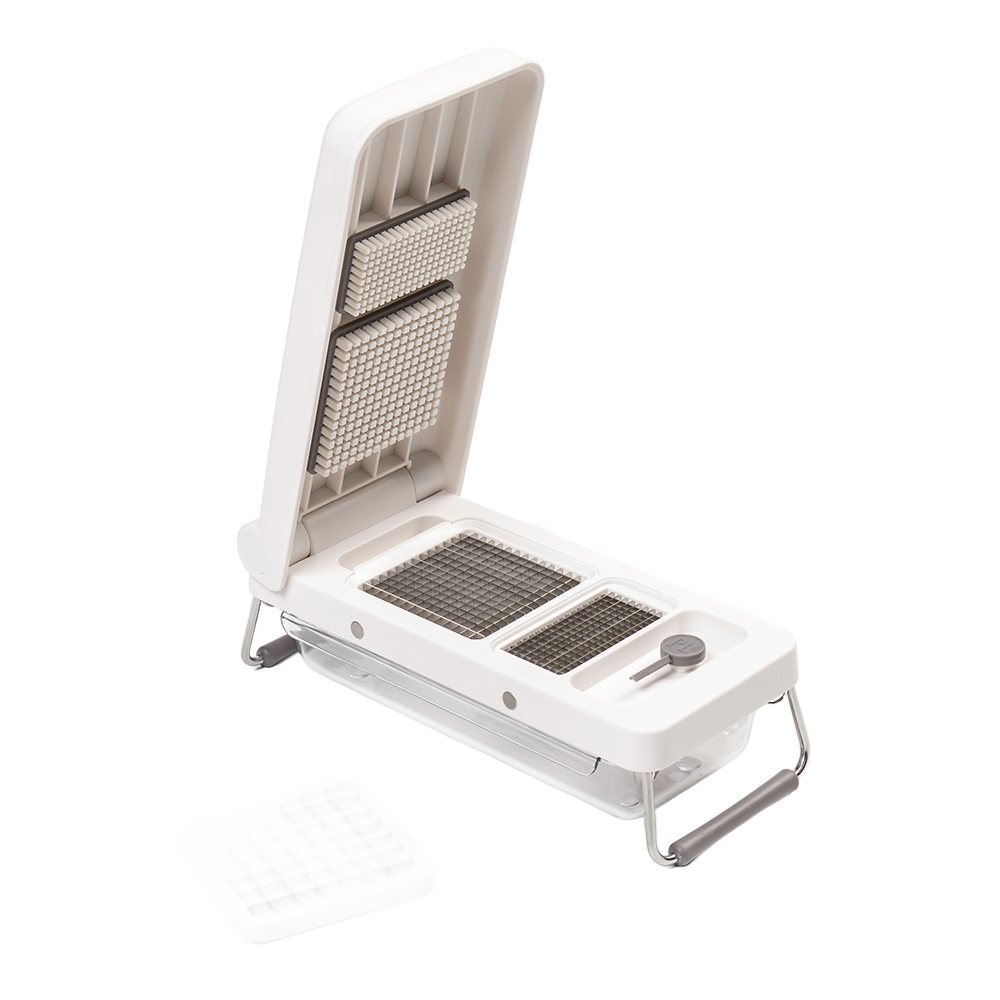 White hinged vegetable chopper with stainless steel grid blades and removable pusher, designed for efficient chopping and dicing, featured in Kitchen & Food and Food Prep collections.