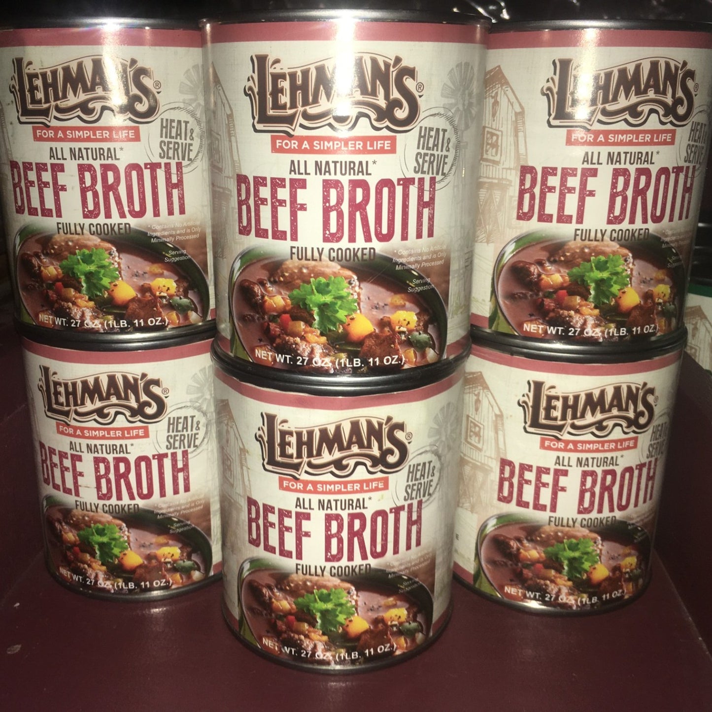 Six cans of Lehman's handcrafted all-natural fully cooked beef broth stacked on a shelf, featured for Farm, Garden & Tool, Kitchen & Food, Emergency Supplies, Food, Meats, Best Sellers, and Promo Eligible collections.