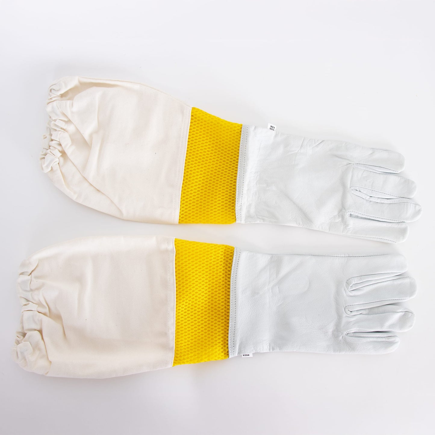 Pair of smooth goatskin gloves with vented yellow sleeves and elastic cuffs, offering durable protection and dexterity for beekeeping in farm, garden, and tool collections.
