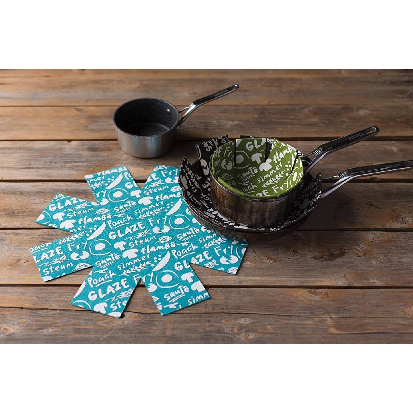 Set of three flexible pan protectors in small, medium, and large sizes with printed cooking terms, designed to cushion pots and pans for safe stacking in Kitchen & Food, Cookware, Pots and Pans, and Storage and Serving collections.