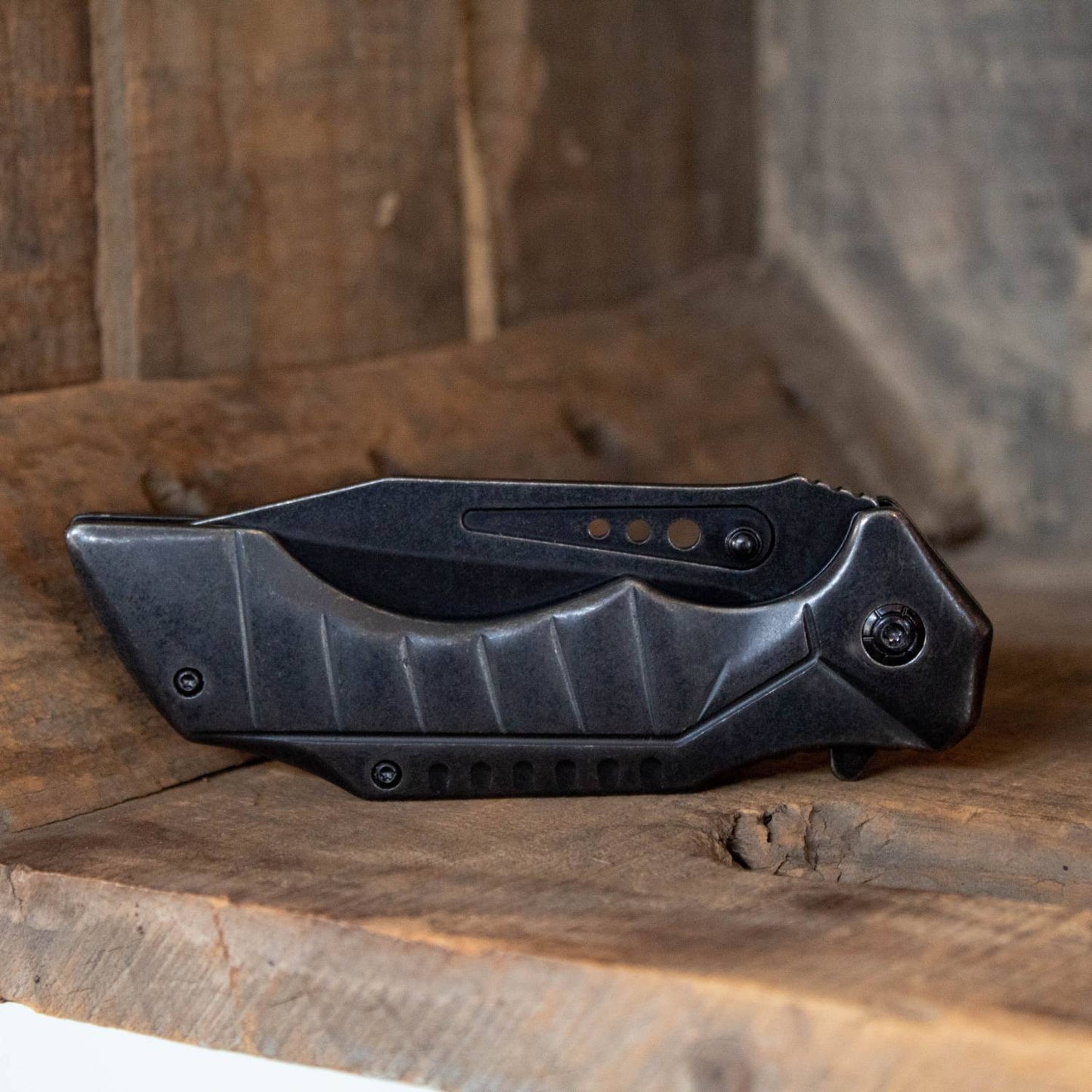 Smithy's Lockback Folding Knife with a rugged blackened stainless blade and ergonomic textured handle, handcrafted for durability in Farm, Garden & Tool and Pocket Knives collections.