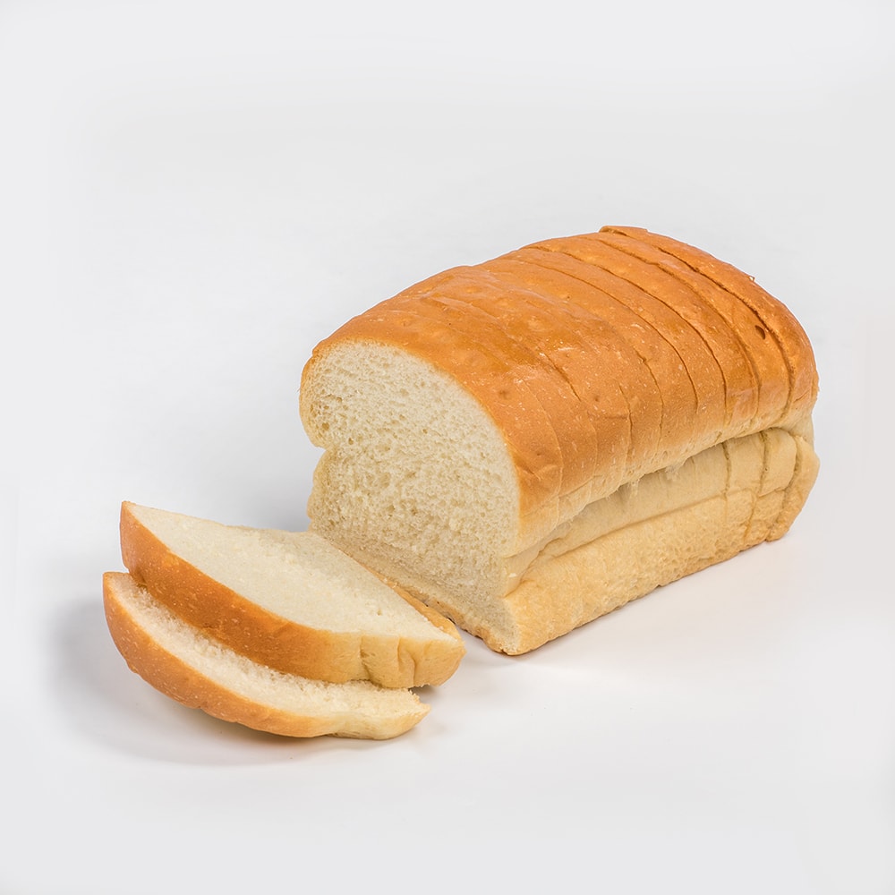Soft, thickly sliced loaf of freshly baked Amish-style bread with a golden crust, handcrafted in the USA, featured in Kitchen & Food, Snacks and Sweets, USA Made, Best Sellers, and Promo Eligible collections.