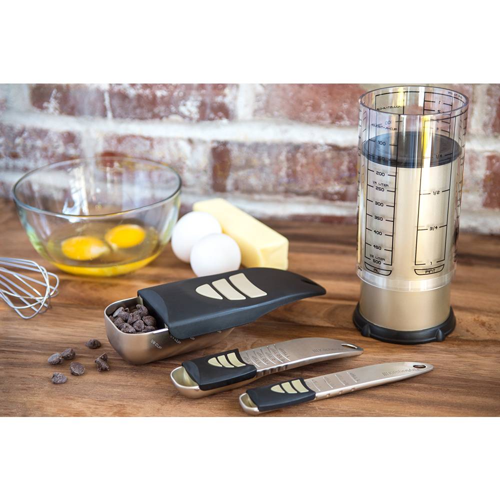 Adjustable measuring set featuring stainless steel scoops and a 2-cup adjustable container with black handles, displayed with eggs, butter, chocolate chips, and a whisk on wood, ideal for Kitchen & Food, Food Prep, Measuring, and Kitchen Gadgets collections.