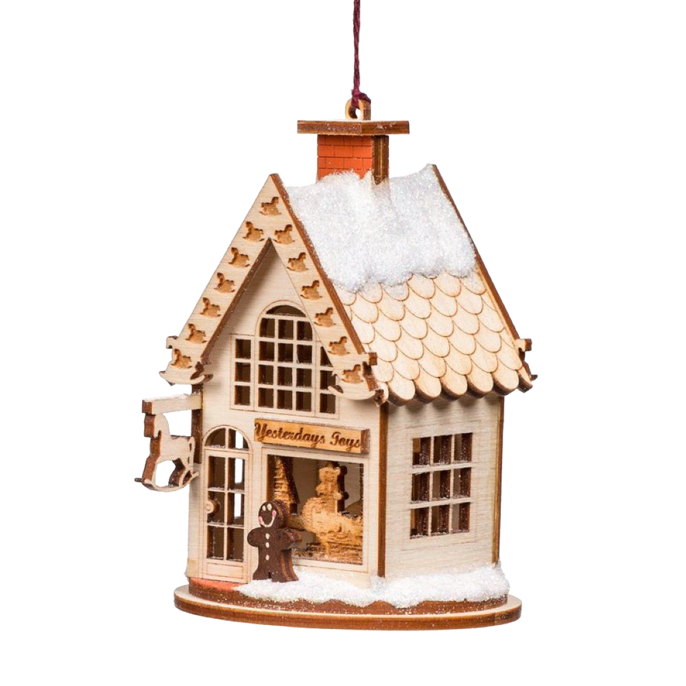 Handcrafted wooden holiday ornament shaped like a vintage toy shop with tiny rocking horses, snowy roof, and intricate details, perfect for Home & Decor and Holiday Decor collections.