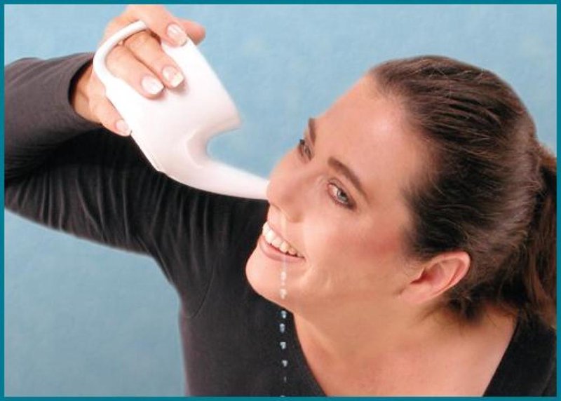 Woman demonstrating use of a white nasal cleansing pot to rinse nasal passages, promoting natural relief in Health & Wellness, Health Remedies, Best Sellers, and Promo Eligible collections.