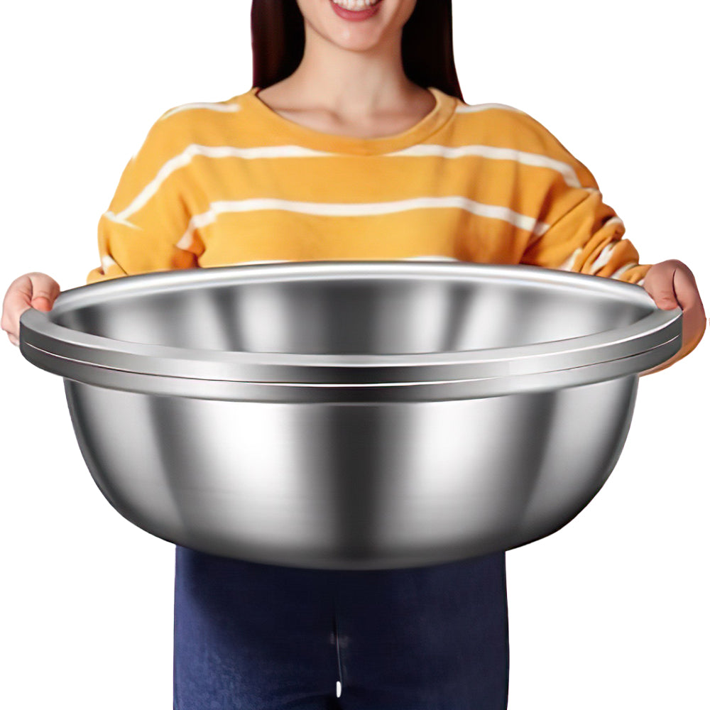 Person holding an extra large stainless steel mixing bowl with a polished mirror finish, suitable for big batch cooking and baking in kitchen and cookware collections.