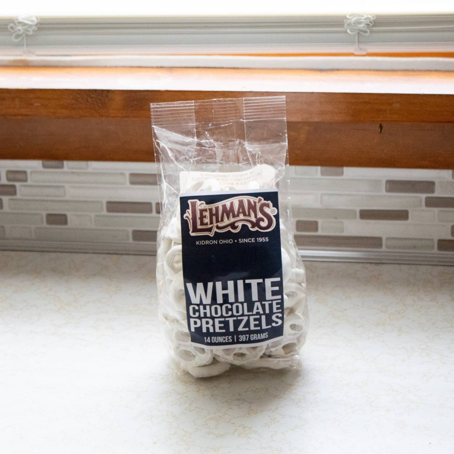Clear resealable bag of handcrafted mini pretzels coated in white chocolate, made in USA, a sweet and salty snack perfect for Kitchen & Food, Snacks and Sweets, Candy, USA Made, Best Sellers, Promo Eligible collections.