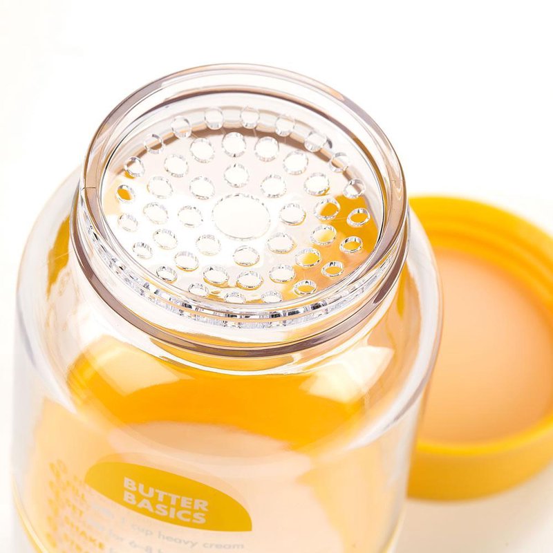 Clear plastic butter maker jar with yellow lid removed, showing textured strainer insert, designed for easy homemade butter making in Farm, Garden & Tool and Kitchen & Food collections.