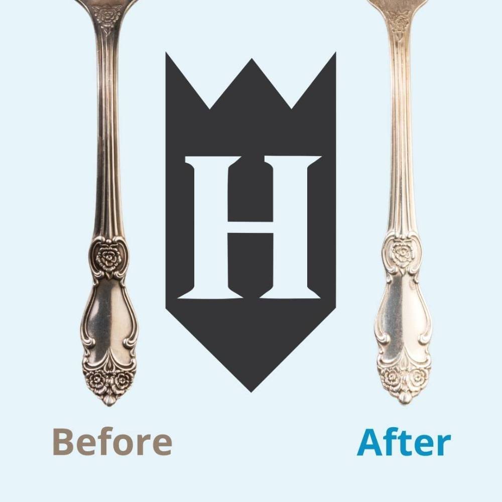 Two ornate silver spoons shown side by side with one tarnished labeled "Before" and the other polished to a bright shine labeled "After," highlighting effective metal restoration for Home & Decor and Household Cleaning collections.
