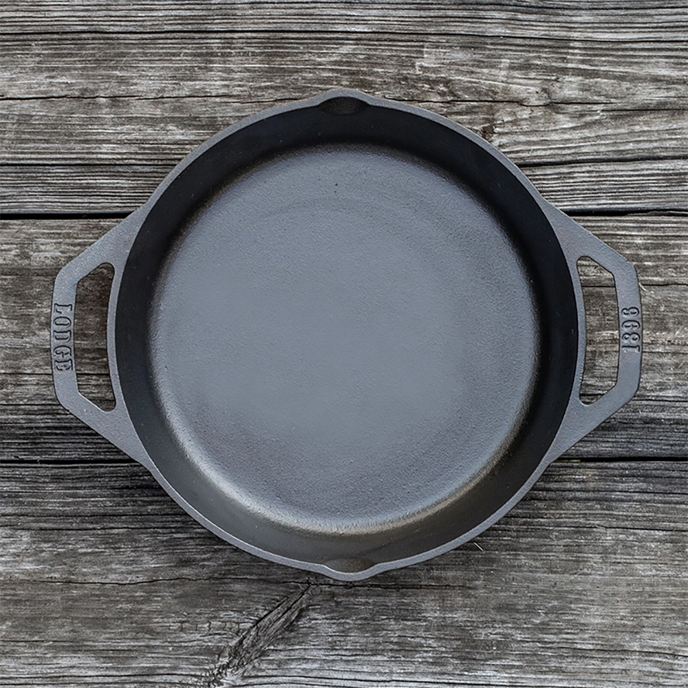 Handcrafted round cast iron pan with short side handles and spouts, pre-seasoned for easy release, durable and versatile for grilling, baking, frying, featured in Kitchen & Food, Cookware, Cast Iron, Best Sellers, Promo Eligible collections.
