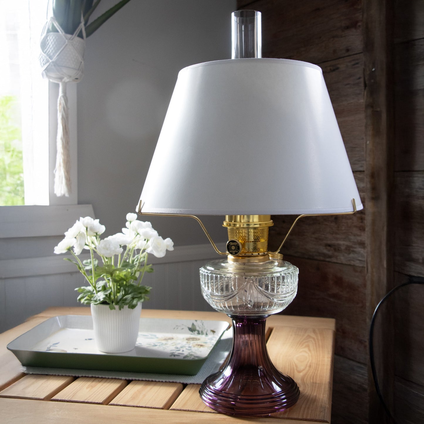 Classic white parchment lamp shade designed for a 14-inch tripod oil lamp, displayed in a cozy rustic setting, ideal for Lamps & Lighting and Lamp Shades collections.