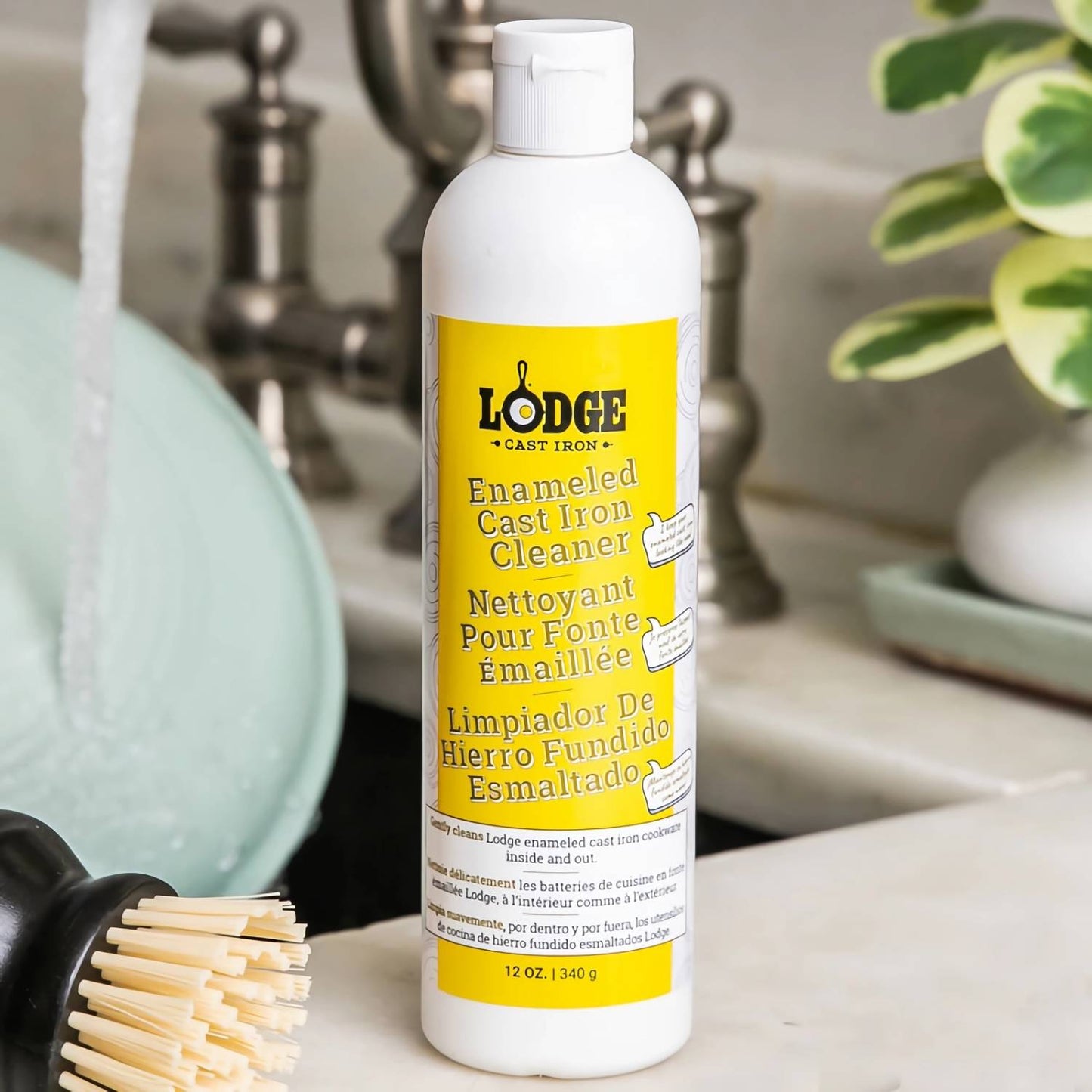 Bottle of gentle cast iron cleaner with a bright yellow label, designed for enameled cookware care, featured in Kitchen & Food, Cookware, Cast Iron, USA Made, and Best Sellers collections.