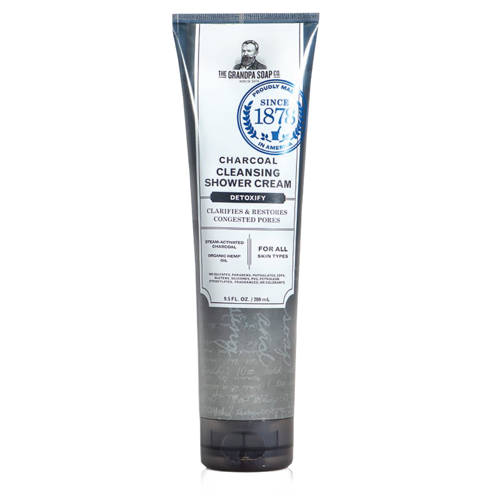 Tall gray and white tube of charcoal cleansing shower cream featuring detoxifying formula with steam-activated charcoal and organic hemp oil, from USA made health and wellness collection.