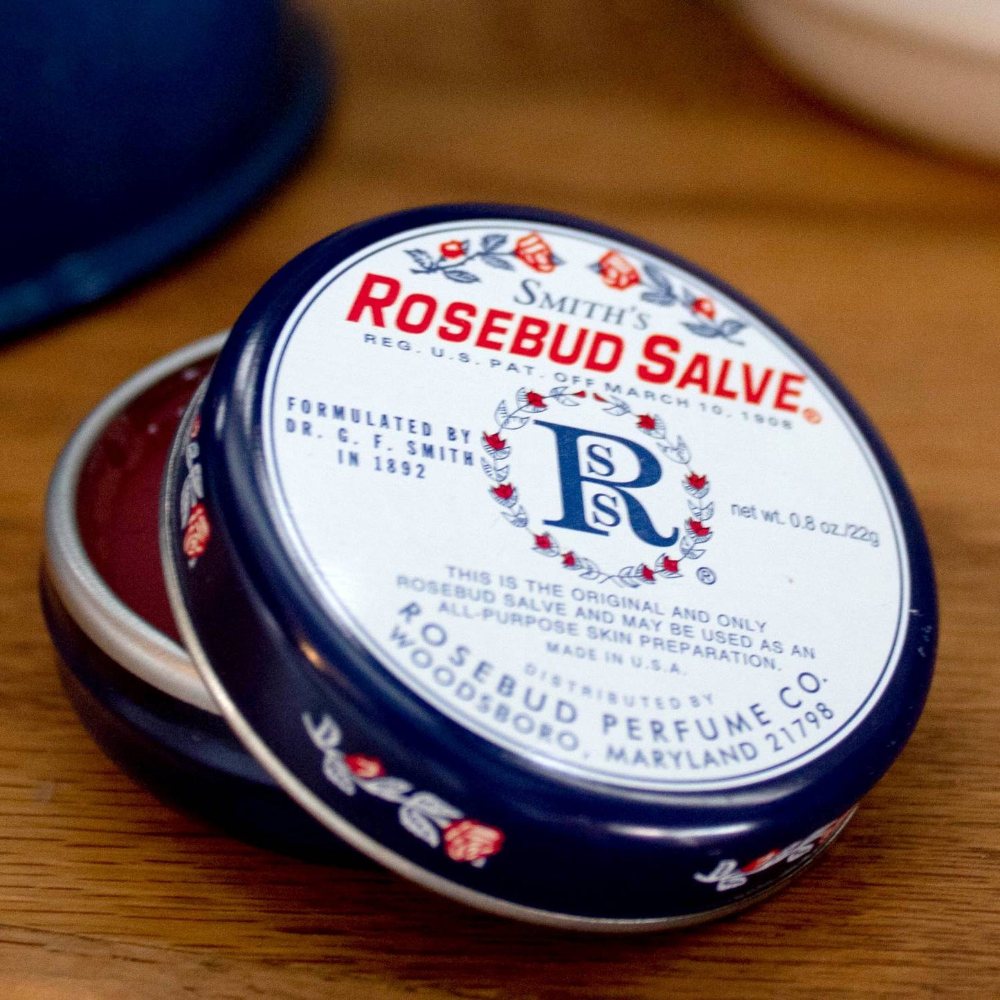 Open round metal tin of handcrafted Original Rosebud Salve with vintage floral label, made in USA, part of Health & Wellness, Health Remedies, and Best Sellers collections.