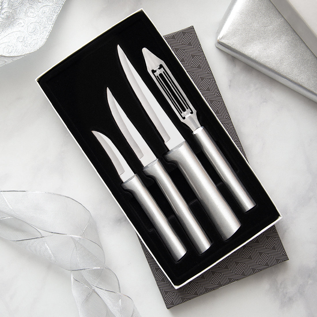 Set of four handcrafted stainless steel kitchen tools including three meal prep knives and a vegetable peeler, made in USA, ideal for Farm, Garden & Tool and Kitchen & Food collections.
