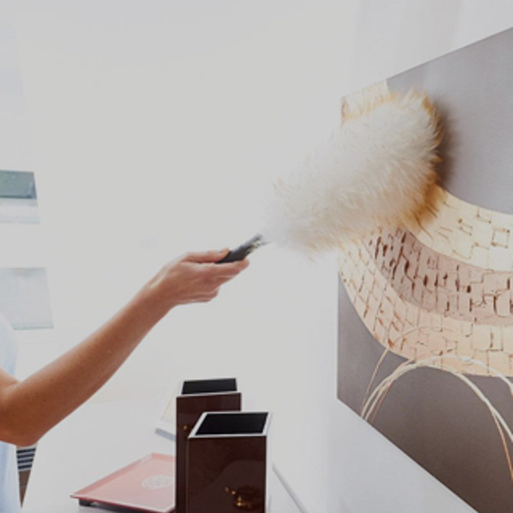 Handcrafted lamb's wool duster with natural fibers and wooden handle, ideal for dusting delicate decor and surfaces, part of Home & Decor and USA Made collections.
