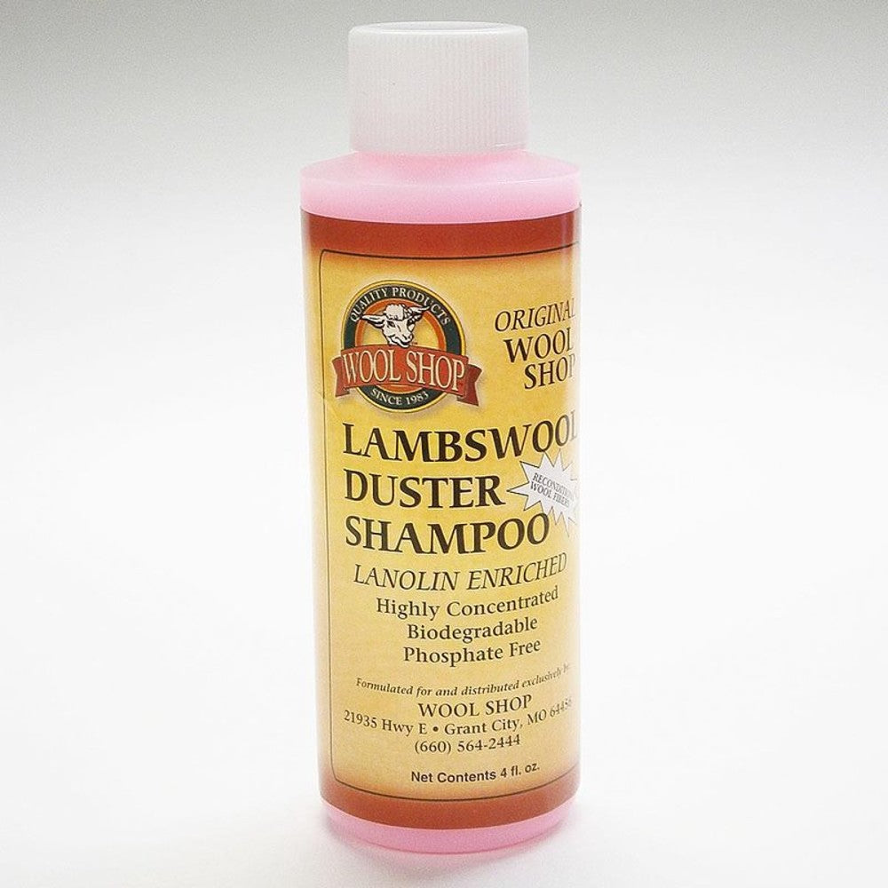 Plastic bottle of lanolin-enriched lambswool duster shampoo in pink liquid, biodegradable and phosphate-free, featured in Home & Decor and Household Cleaning collections.