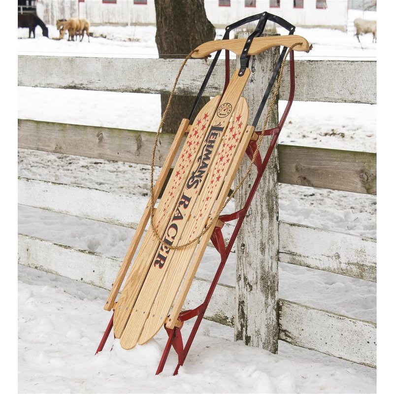 Handcrafted Amish made sled featuring smooth solid oak wood slats with "Lehman's Racer" lettering, red metal runners, and braided rope, perfect for outdoor play and USA Made collections.