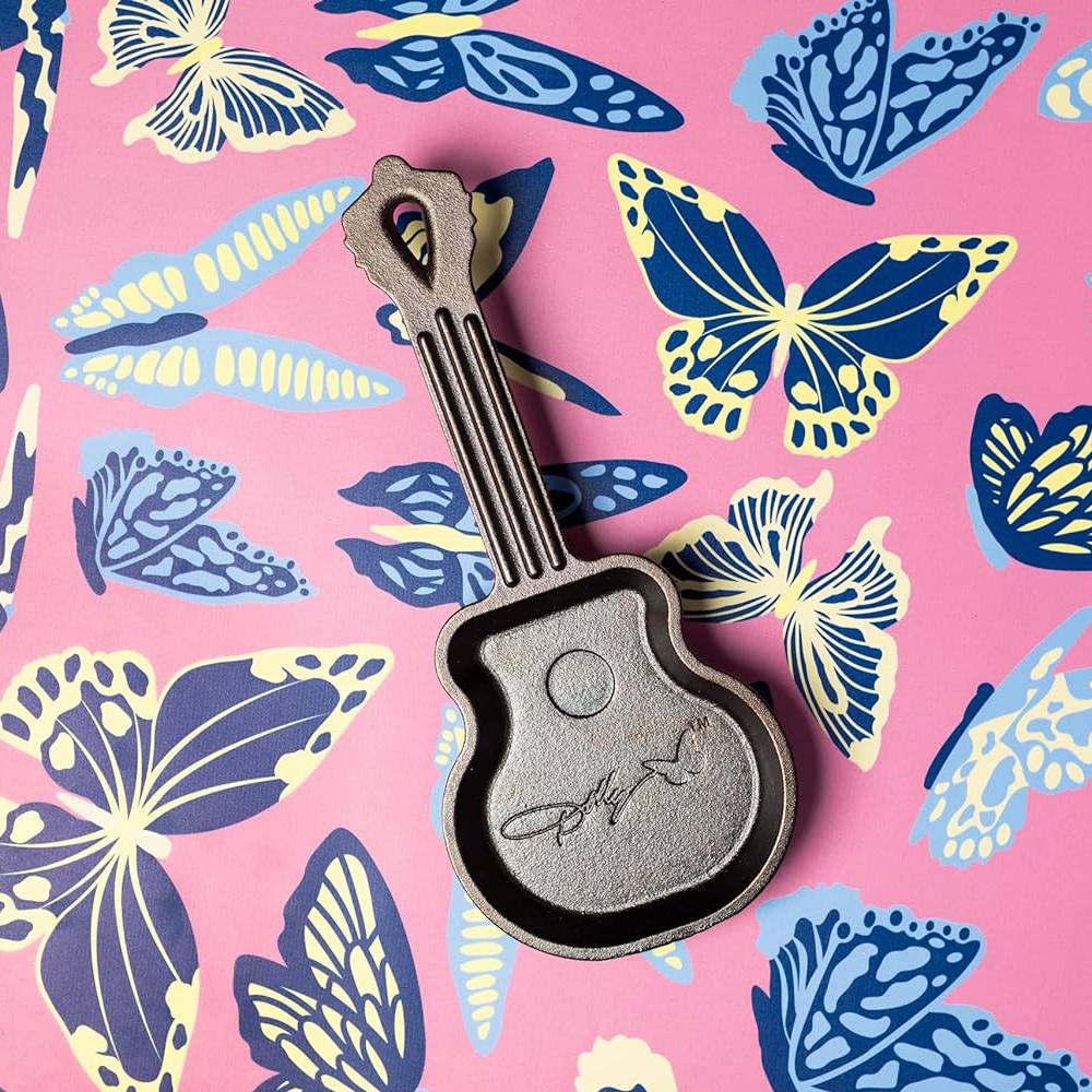 Handcrafted cast iron mini skillet shaped like a guitar with embossed signature detail, made in USA, featured in Kitchen & Food, Cookware, Cast Iron, USA Made, Best Sellers, and Promo Eligible collections.
