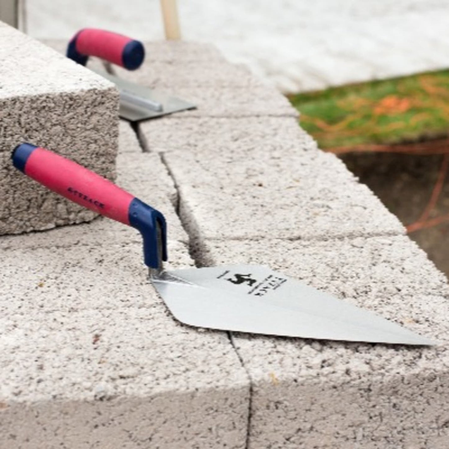 4-inch hardened and tempered carbon steel pointing trowel with ergonomic red and navy soft-feel handle, designed for Farm, Garden & Tool, Digging and Cultivating, and Hand Tools and Hardware collections.