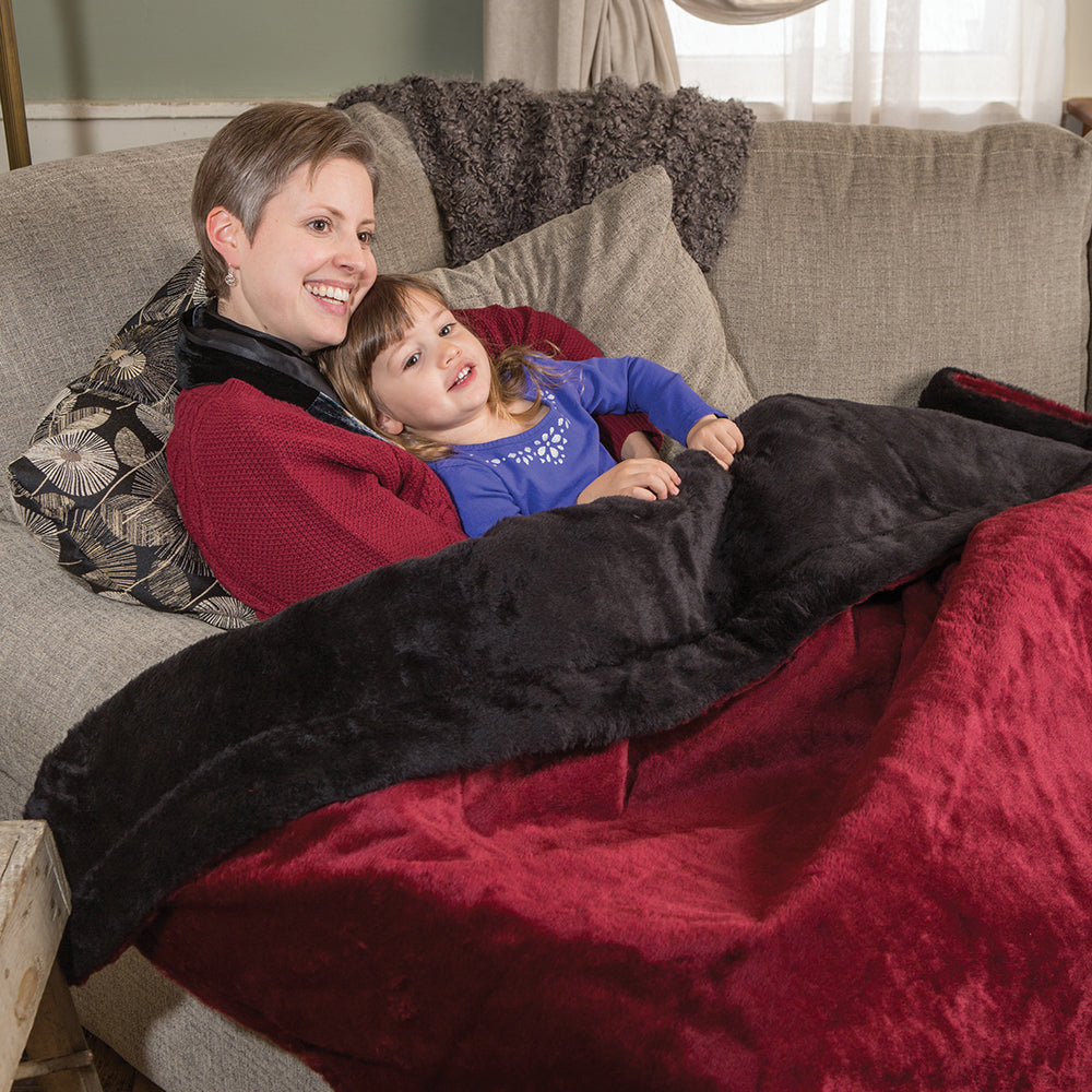 Cozy Amish made lap robe in deep red with plush black faux fur exterior and synthetic quilted lining, perfect for Home & Decor, Farm, Garden & Tool, and USA Made collections.