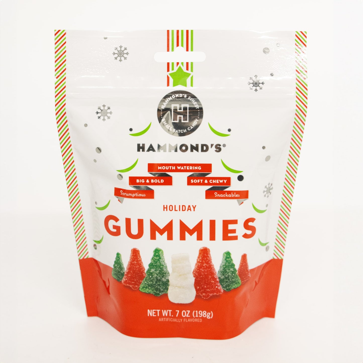Resealable bag of handcrafted, USA-made holiday gummies shaped like Christmas trees and snowmen in red, green, and white sugar coating, featured in Kitchen & Food and Candy collections.