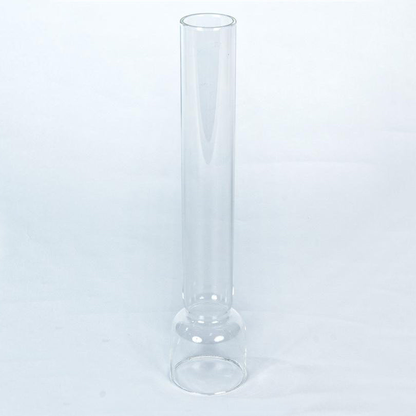 Clear glass chimney with a slender, cylindrical shape and a rounded base, designed for use with table, shelf, and cottage oil lamps, featured in Lamps & Lighting and Parts and Accessories collections.