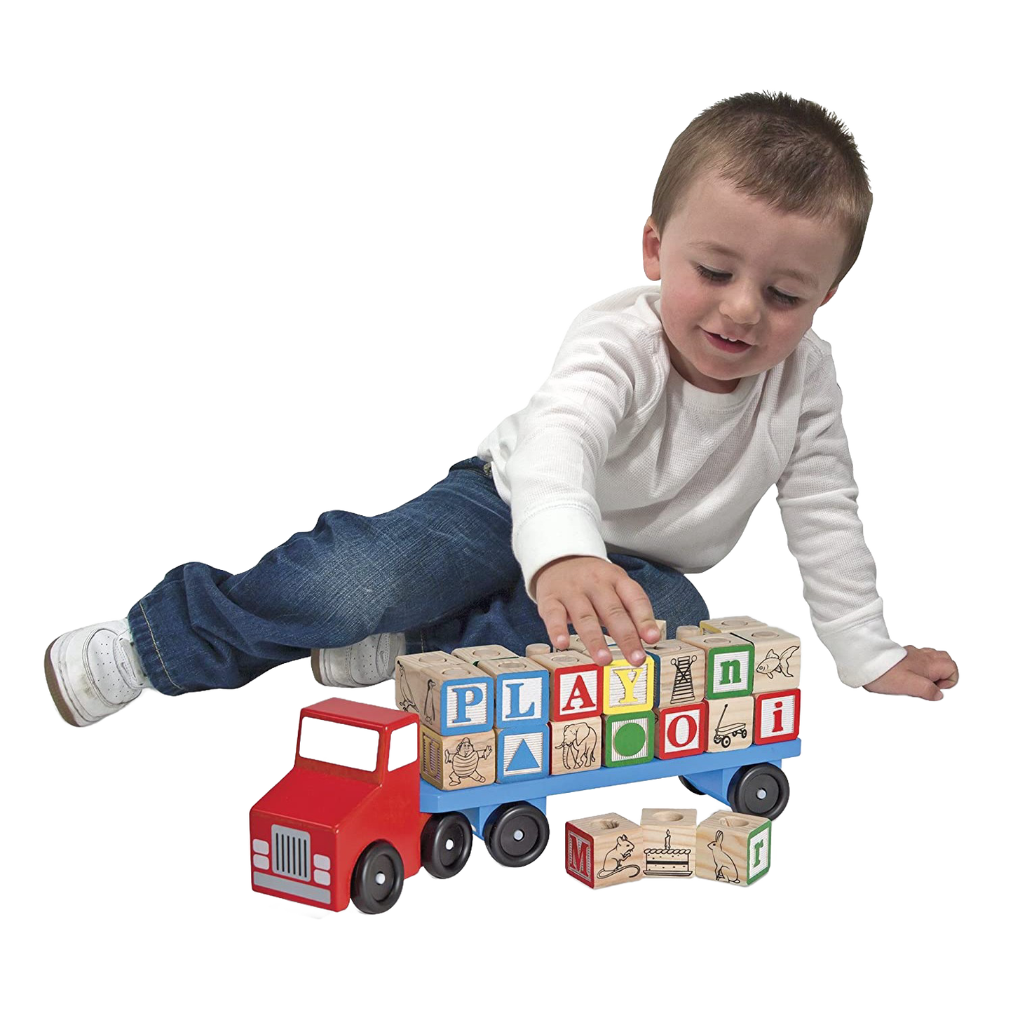 Young child playing with a handcrafted wooden truck and 28 colorful alphabet blocks featuring letters, pictures, and shapes, part of children's wooden toys and best sellers collections.