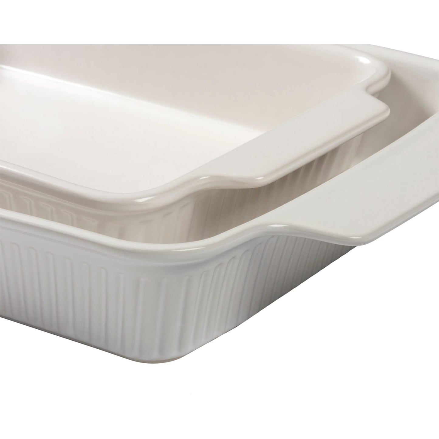 Set of two handcrafted cream stoneware baking dishes with handles and subtle ribbed design, perfect for Kitchen & Food, Bakeware, Cookware, and Baking Supplies collections.