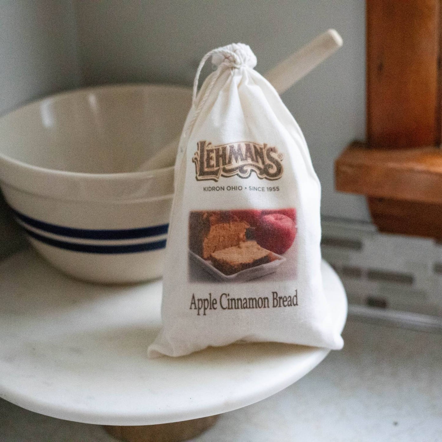 Natural fabric drawstring bag containing handcrafted apple cinnamon bread mix with rustic branding, perfect for Kitchen & Food, Pantry, Dry Goods and Mixes, Best Sellers, Promo Eligible collections.