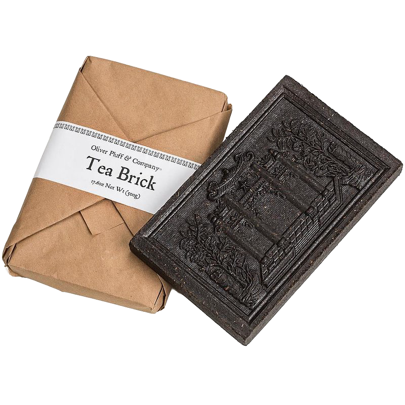 Handcrafted black tea brick with intricate embossed design, wrapped in rustic brown paper packaging, ideal for Kitchen & Food, Brewing Coffee and Tea, Beverages, and Best Sellers collections.