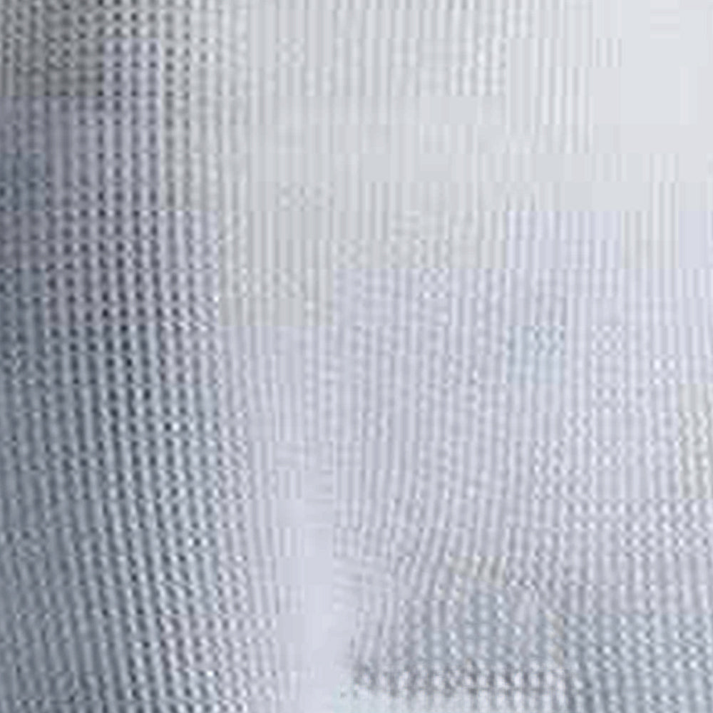 Close-up of white handcrafted cotton-rich fabric with circular waffle knit pattern, designed for warmth and comfort in Health & Wellness, Clothing and Accessories, and Best Sellers collections.