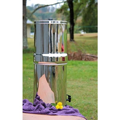 Polished stainless steel water filtration system with nested chambers and spigot, designed for clean water use in appliances, emergency supplies, and water treatment collections.