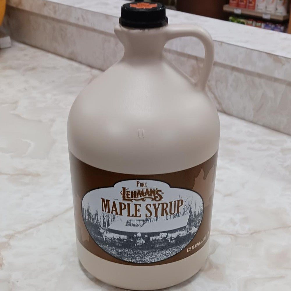 Handcrafted beige jug of amber maple syrup with vintage brown label featuring a historic sugar shack scene, made in USA, suitable for Kitchen & Food, Pantry, USA Made, Best Sellers, and Promo Eligible collections.