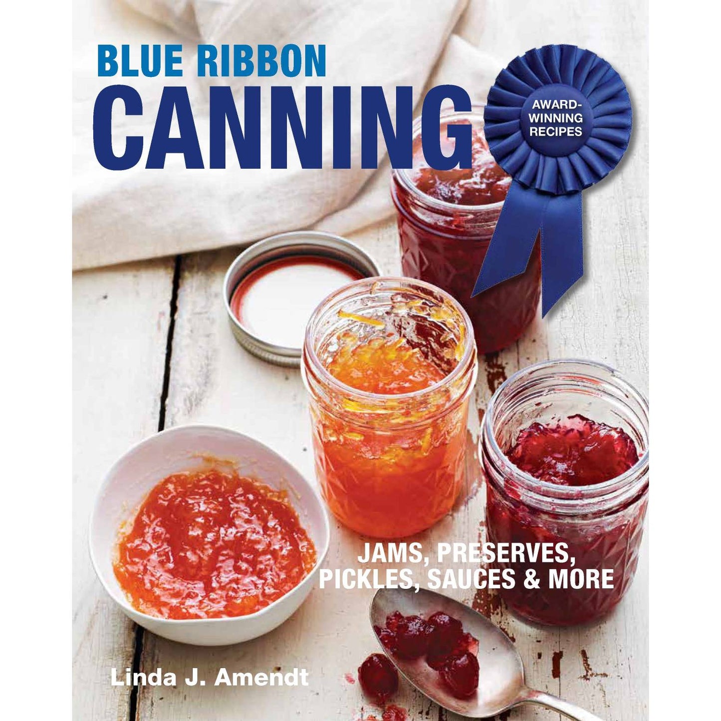 Cookbook cover featuring jars of homemade jams and preserves on a rustic wooden surface, highlighting award-winning canning recipes in cookbooks, home and garden how-to, and best sellers collections.