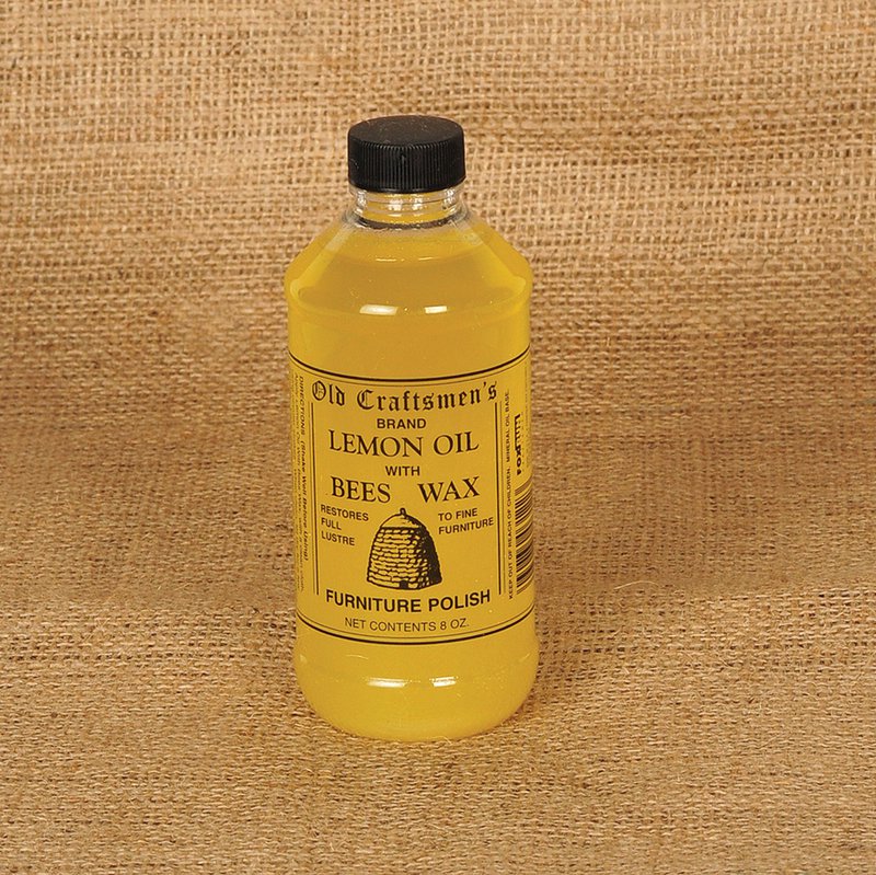 Clear yellow lemon oil and beeswax furniture polish in a bottle with vintage label, handcrafted formula made in USA, featured in Home & Decor and Cleaners and Polishes collections.
