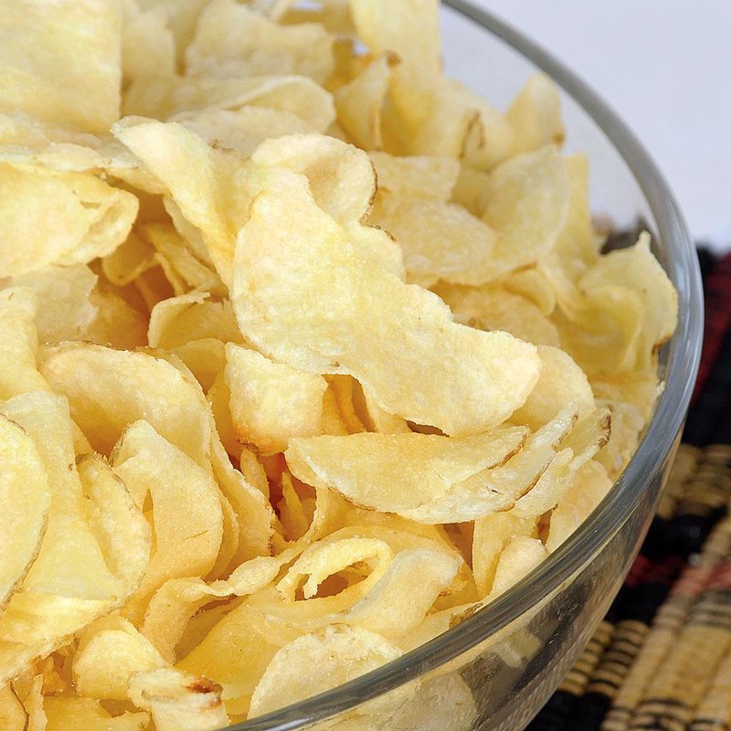 Clear glass bowl filled with light, crunchy golden potato chips, perfect for snack lovers in Kitchen & Food, Snacks and Sweets, USA Made, and Best Sellers collections.