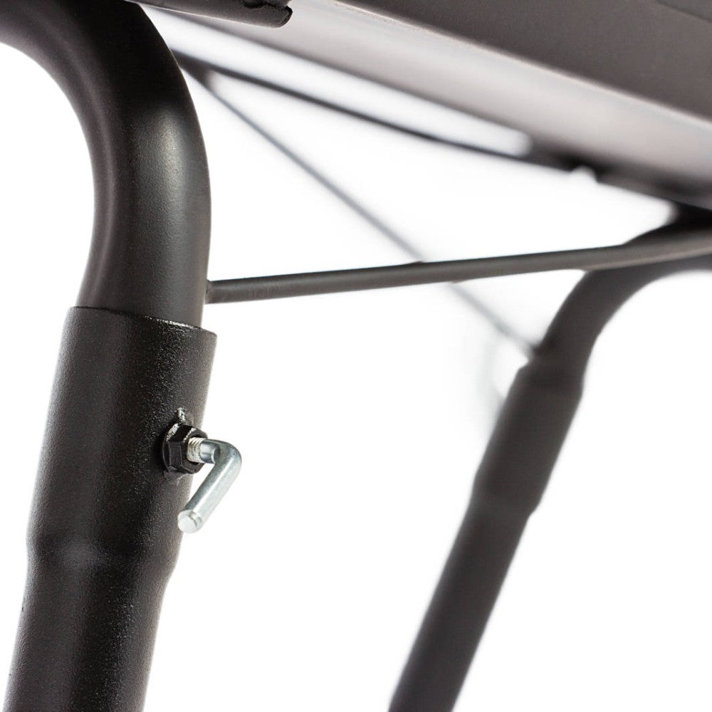Close-up of black steel folding legs with locking mechanism on a sturdy outdoor cooking table, designed for camping and farm use, featured in Farm, Garden & Tool and Best Sellers collections.