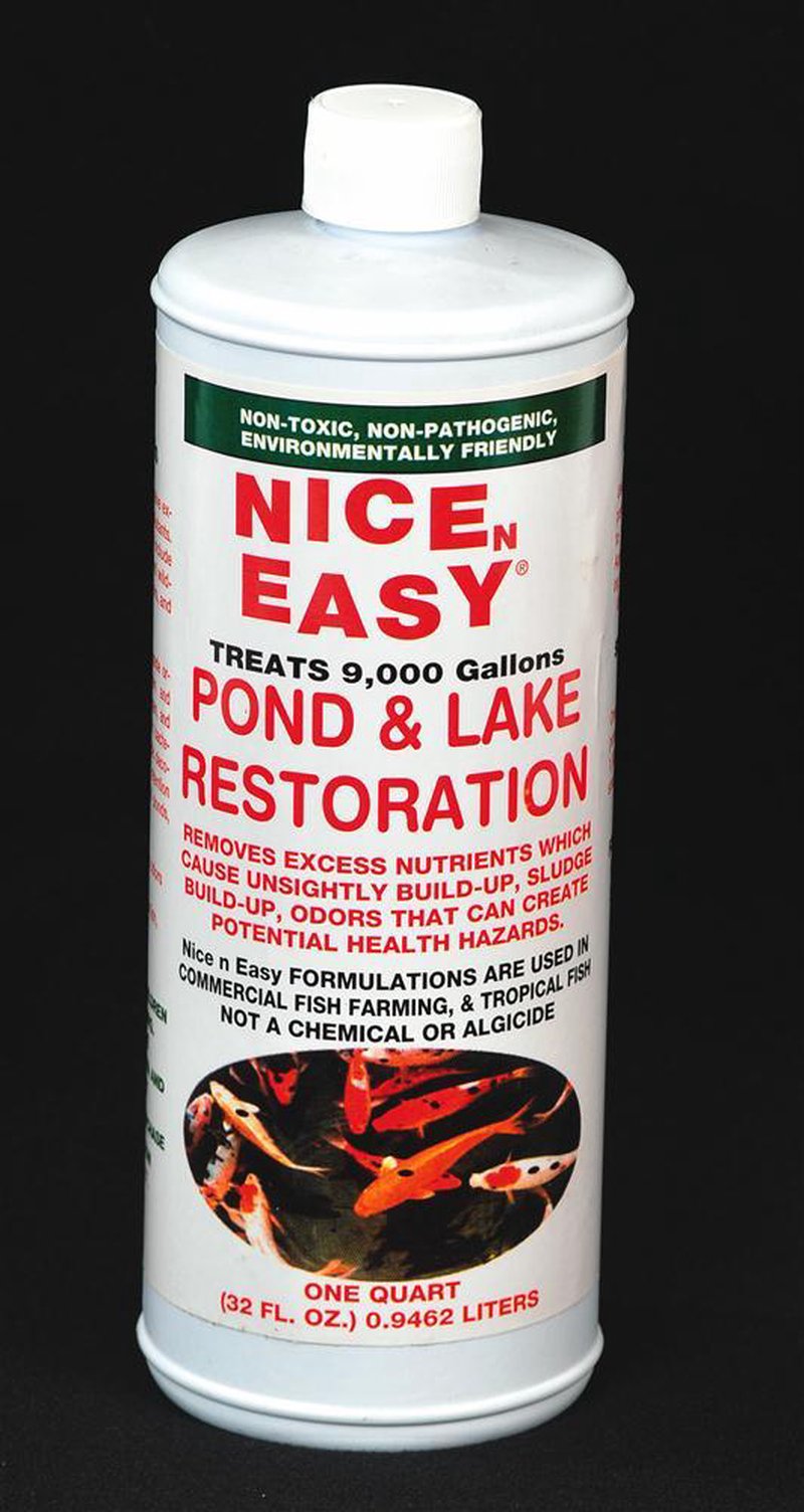 White plastic quart bottle labeled for pond and lake restoration treatment, highlighting non-toxic, environmentally friendly formula and usage for up to 9,000 gallons in Farm, Garden & Tool and Lawncare collections.