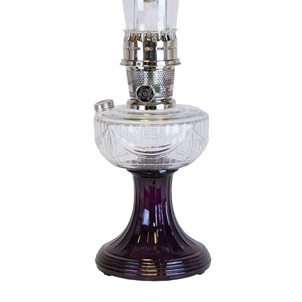 Handcrafted oil lamp with a clear glass font over a sweeping amethyst glass pedestal base and polished metal burner, perfect for Lamps & Lighting, Oil Lamps, Table Lamps, and Best Sellers collections.