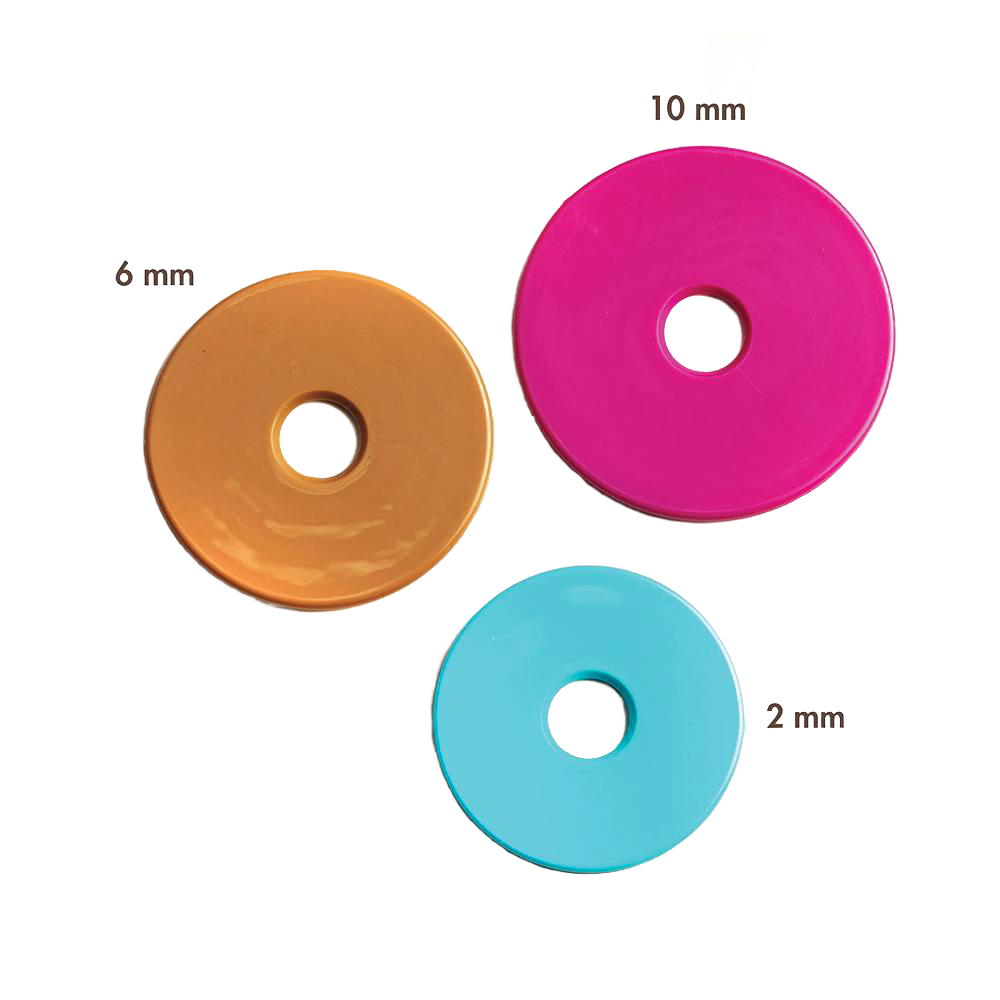 Set of three colorful removable thickness discs in yellow, pink, and blue for adjustable rolling pin, handmade for precise dough rolling in kitchen and baking supplies collections.