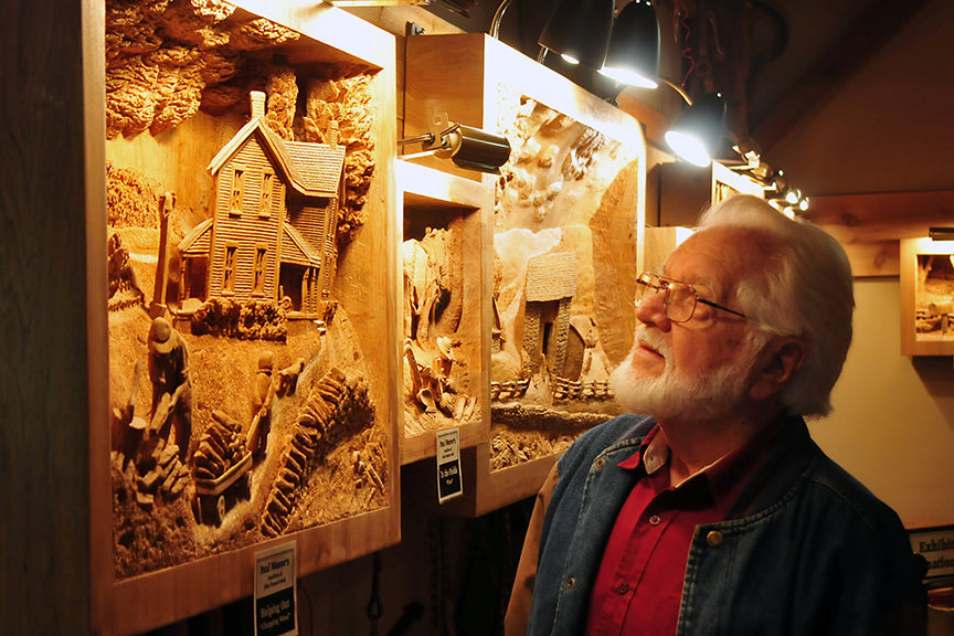 Amish Woodcarver Displays Work At Lehman's In Kidron, Ohio