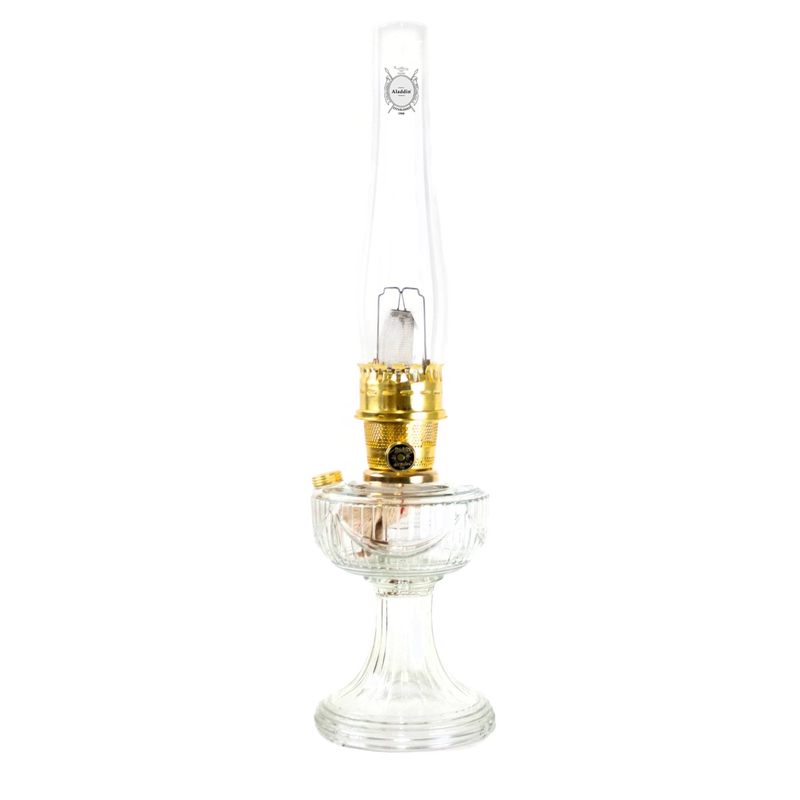 Handcrafted clear glass oil lamp with polished brass burner and tall chimney, featuring a classic design, part of Lamps & Lighting, Oil Lamps, Table Lamps, Best Sellers, and Promo Eligible collections.